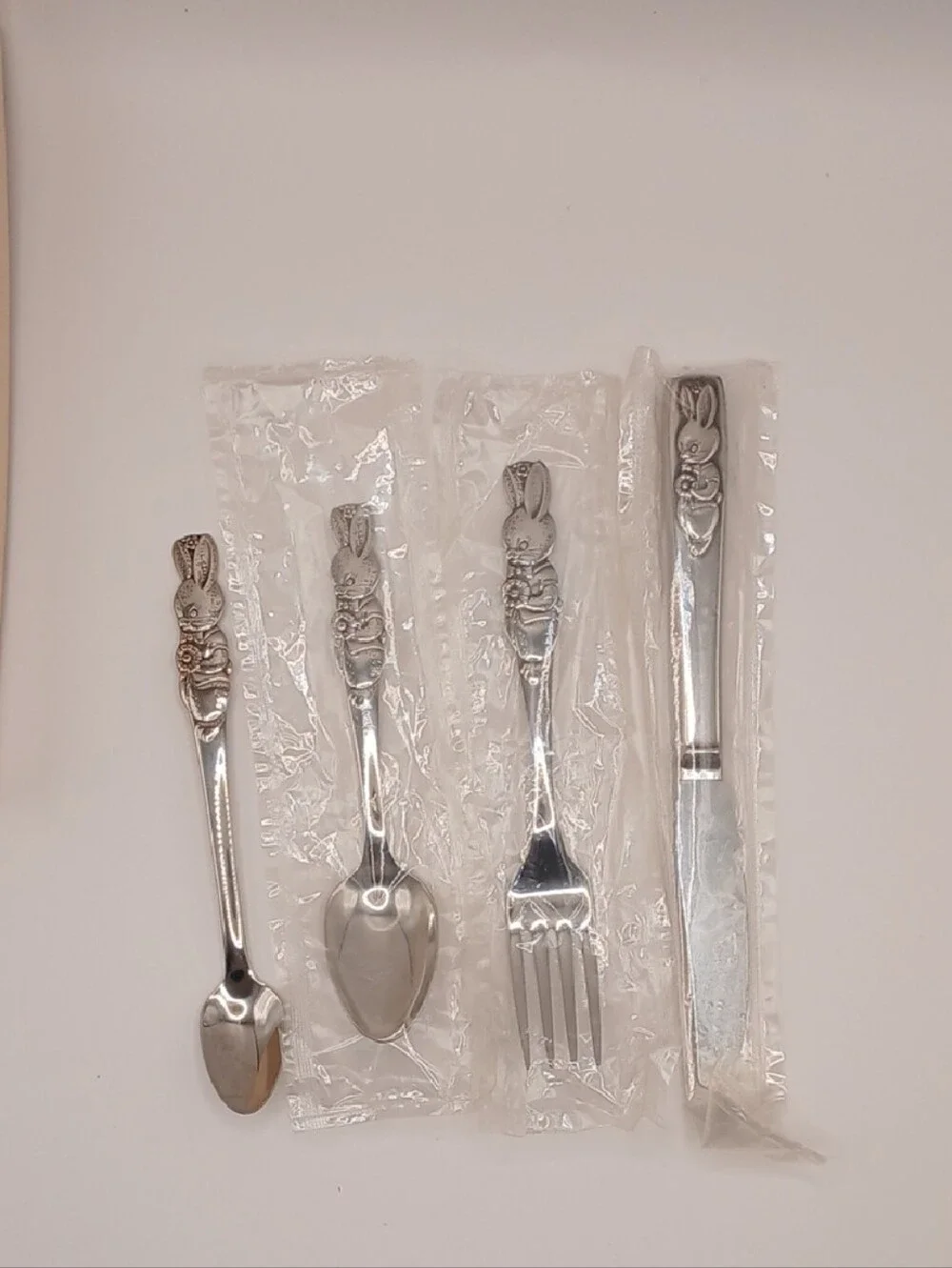 Oneida Peter Rabbit Child's Vtg Stainless Flatware Set of 4 (3 new, 1 used)